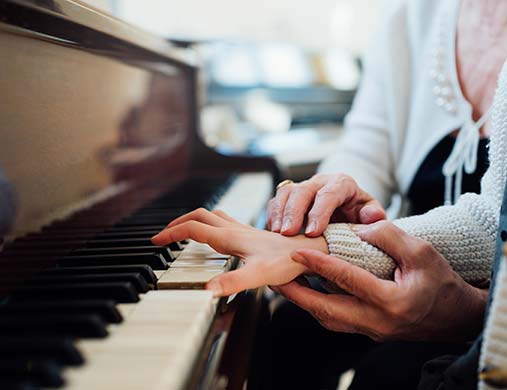 Piano lesson at Piero's Music Store, Bayonne, NJ