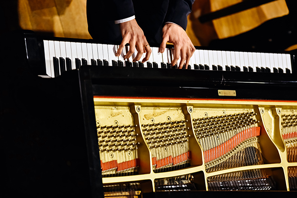 https://pierosmusic.com/wp-content/uploads/2025/03/pianist-and-piano-from-above-2024-10-18-08-27-37-utc.jpg