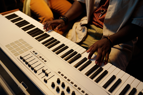 https://pierosmusic.com/wp-content/uploads/2025/03/playing-keyboard-in-studio-with-midi-controller-an-2025-03-16-01-49-01-utc.jpg